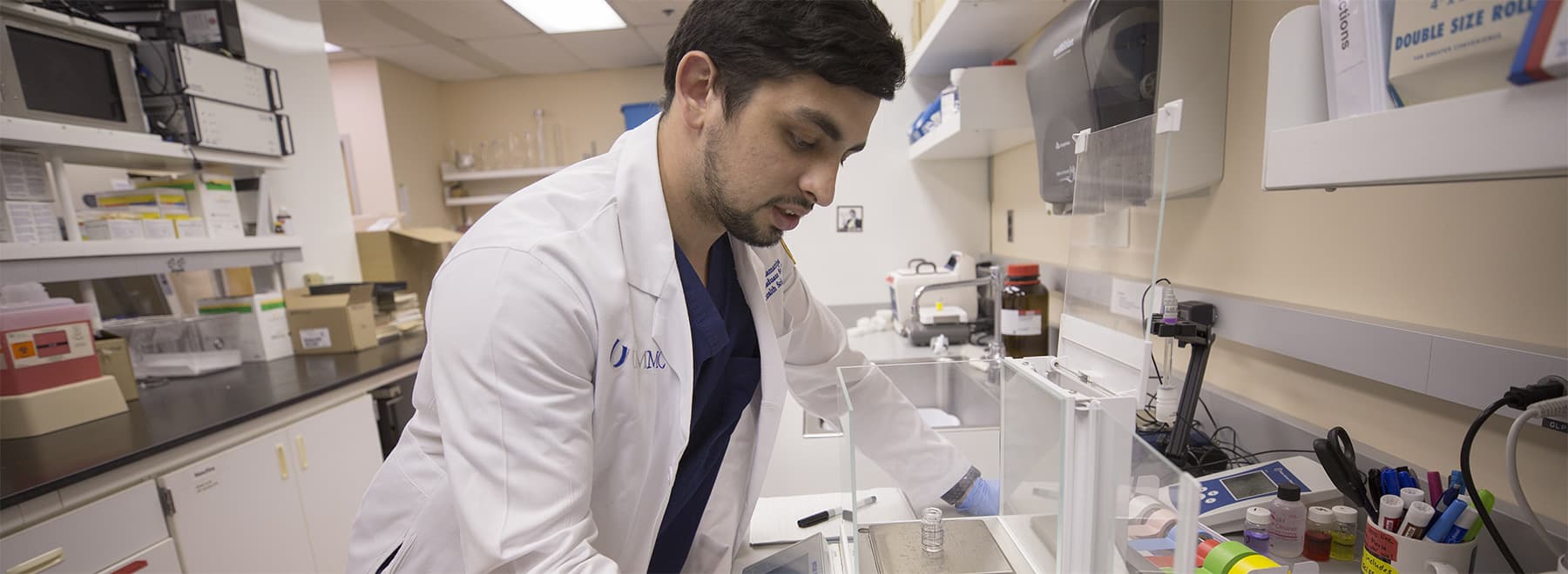 faculty in a lab setting